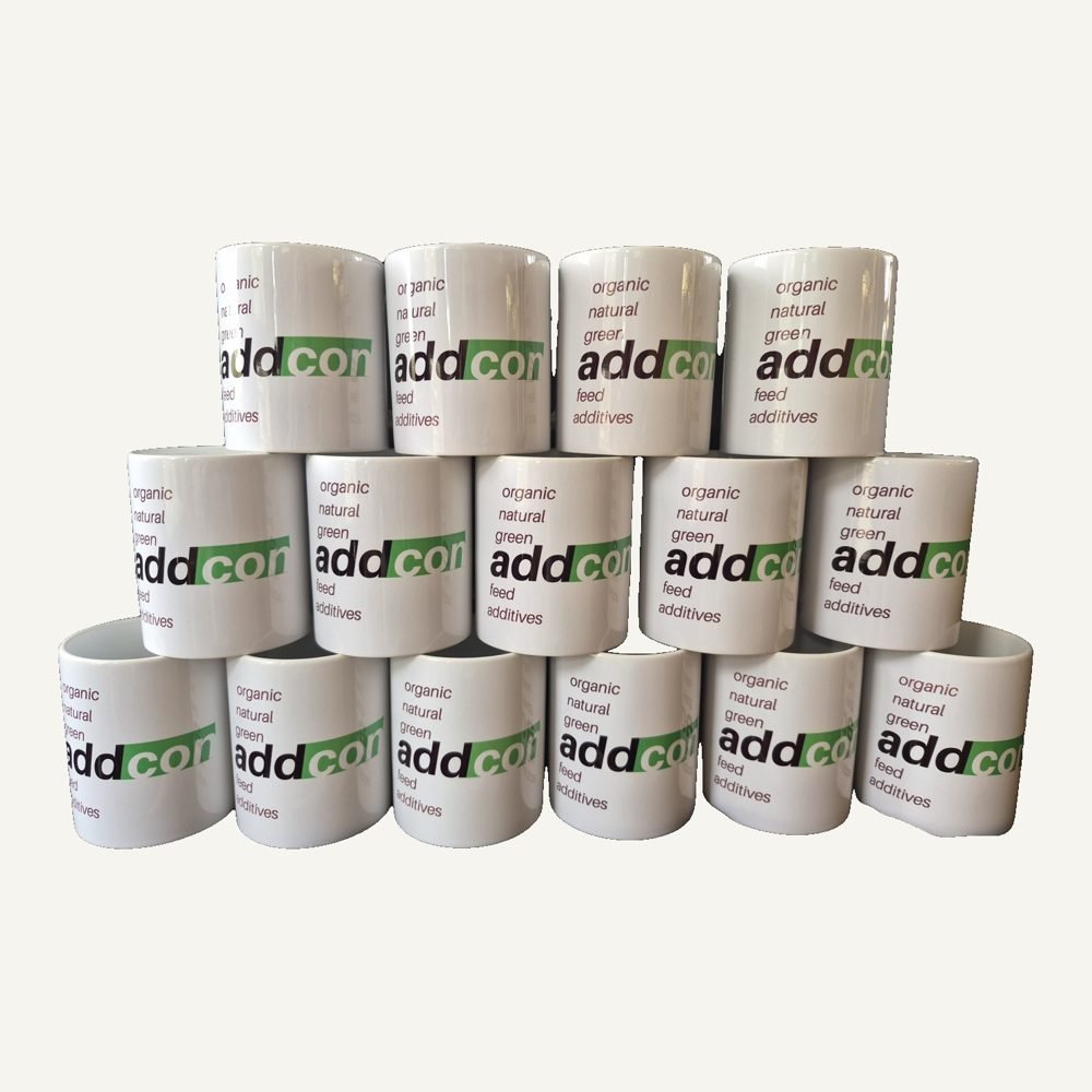 Stack of branded company mugs