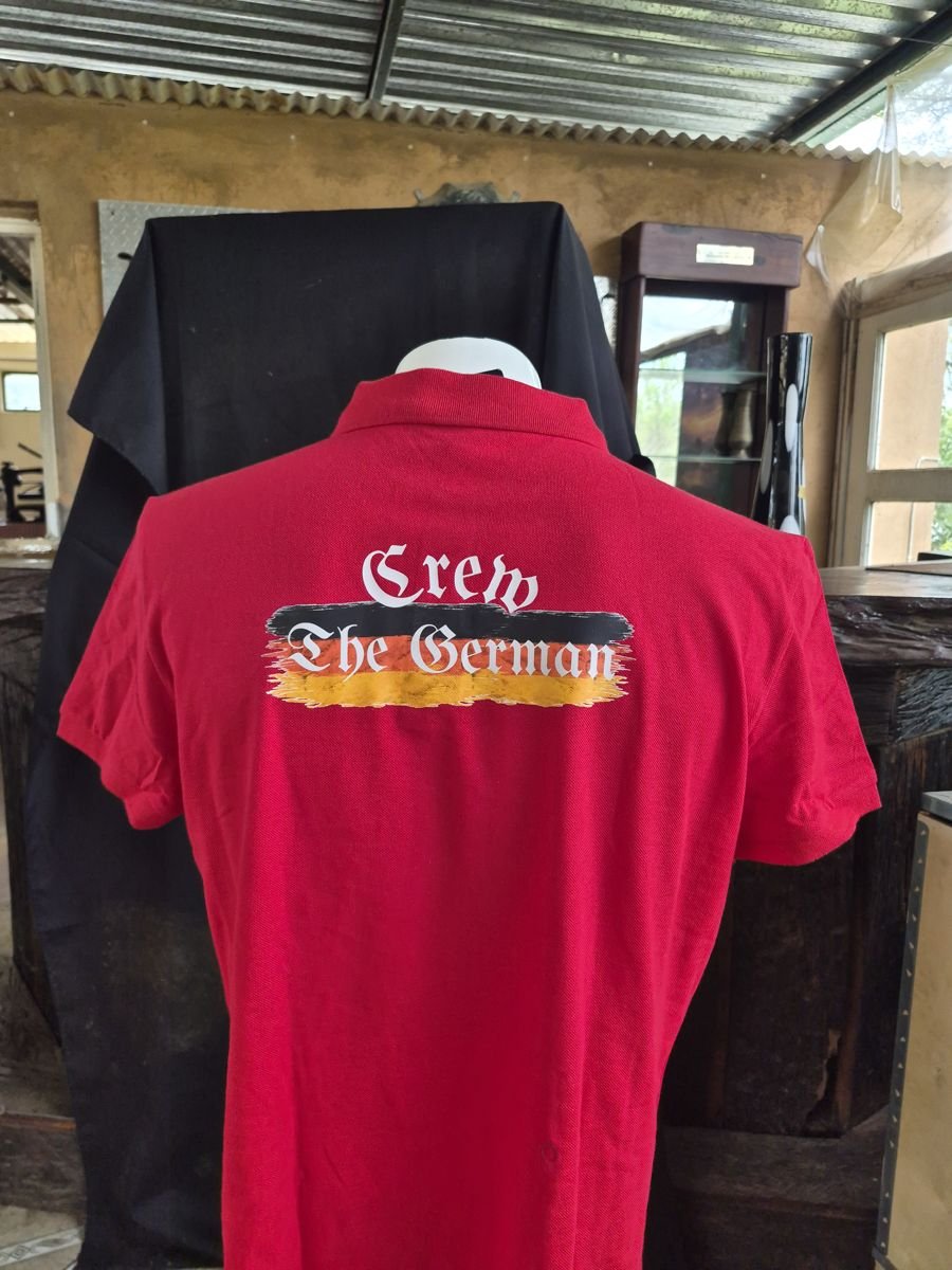 Red golf shirt branded for a restaurant crew